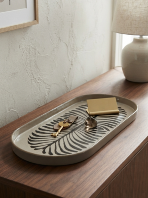 Vide poche noir et beige