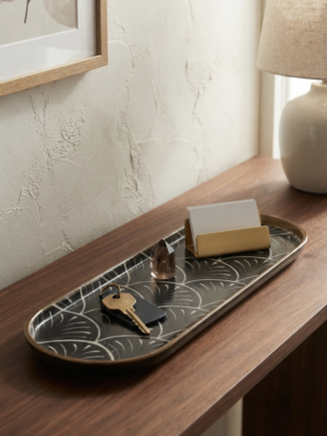 Vide poche beige et noir